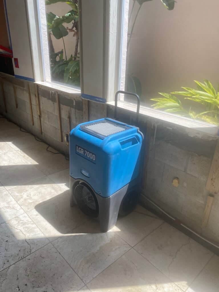 LGR dehumidifier running on a TLG Restoration drying job
